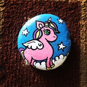 Examples of Art I paint on rocks!